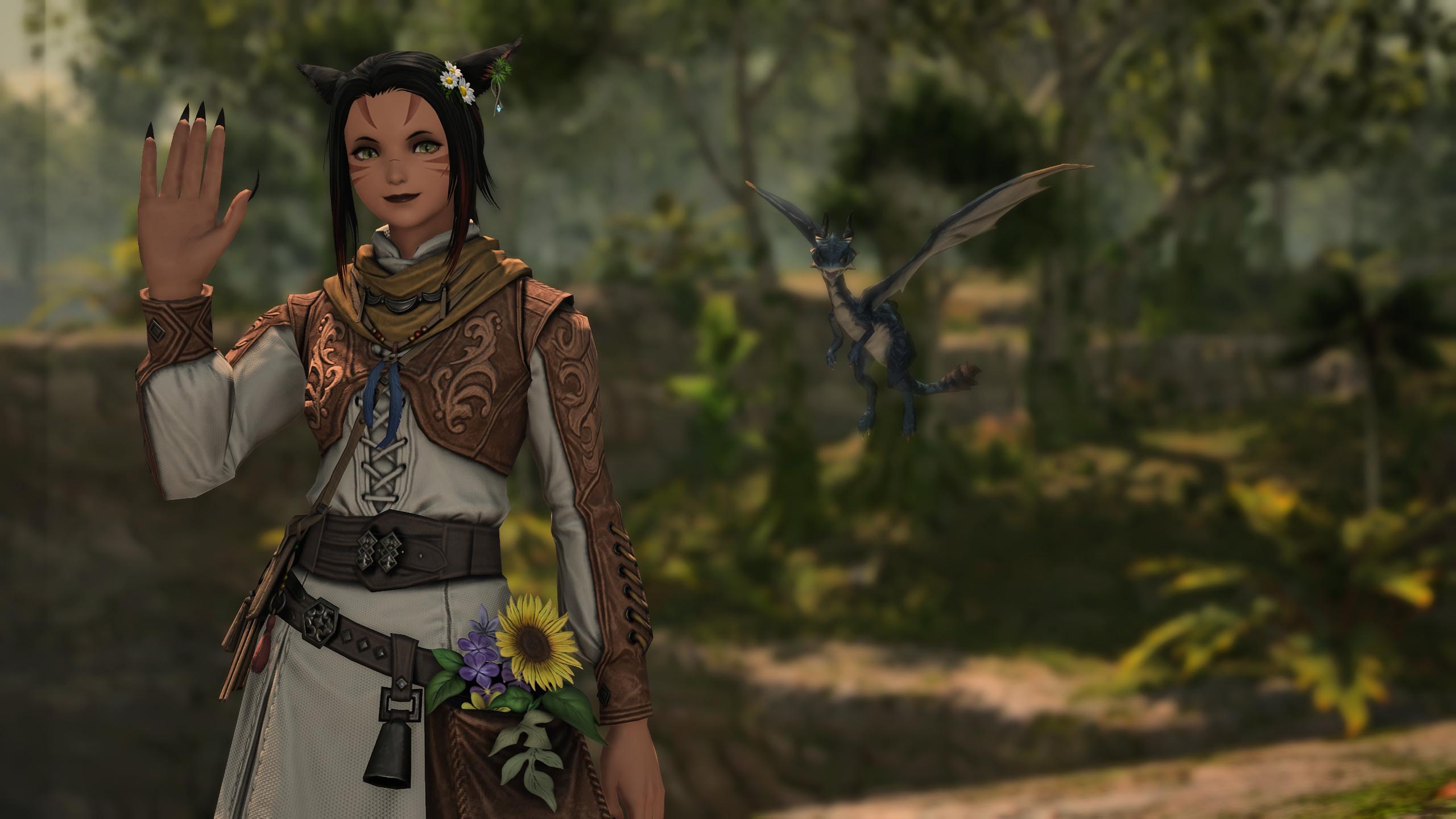 A simple screenshot of my main FFXIV character, in a green forest, wearing a simple pale brown and white tunic, and carrying flowers in a side-bag.

She's waving and smiling slightly.
