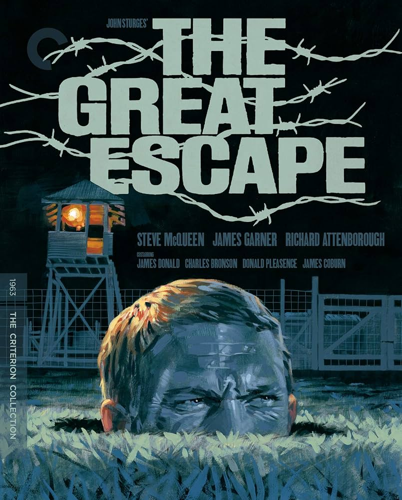 Cover of The Great Escape, with Steve McQueen poking his head out of a hole in the ground.