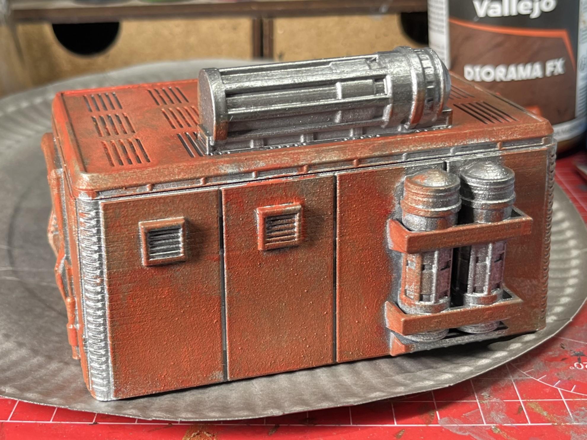 Rear view of a badly painted orange sci-fi 28mm scale model building.