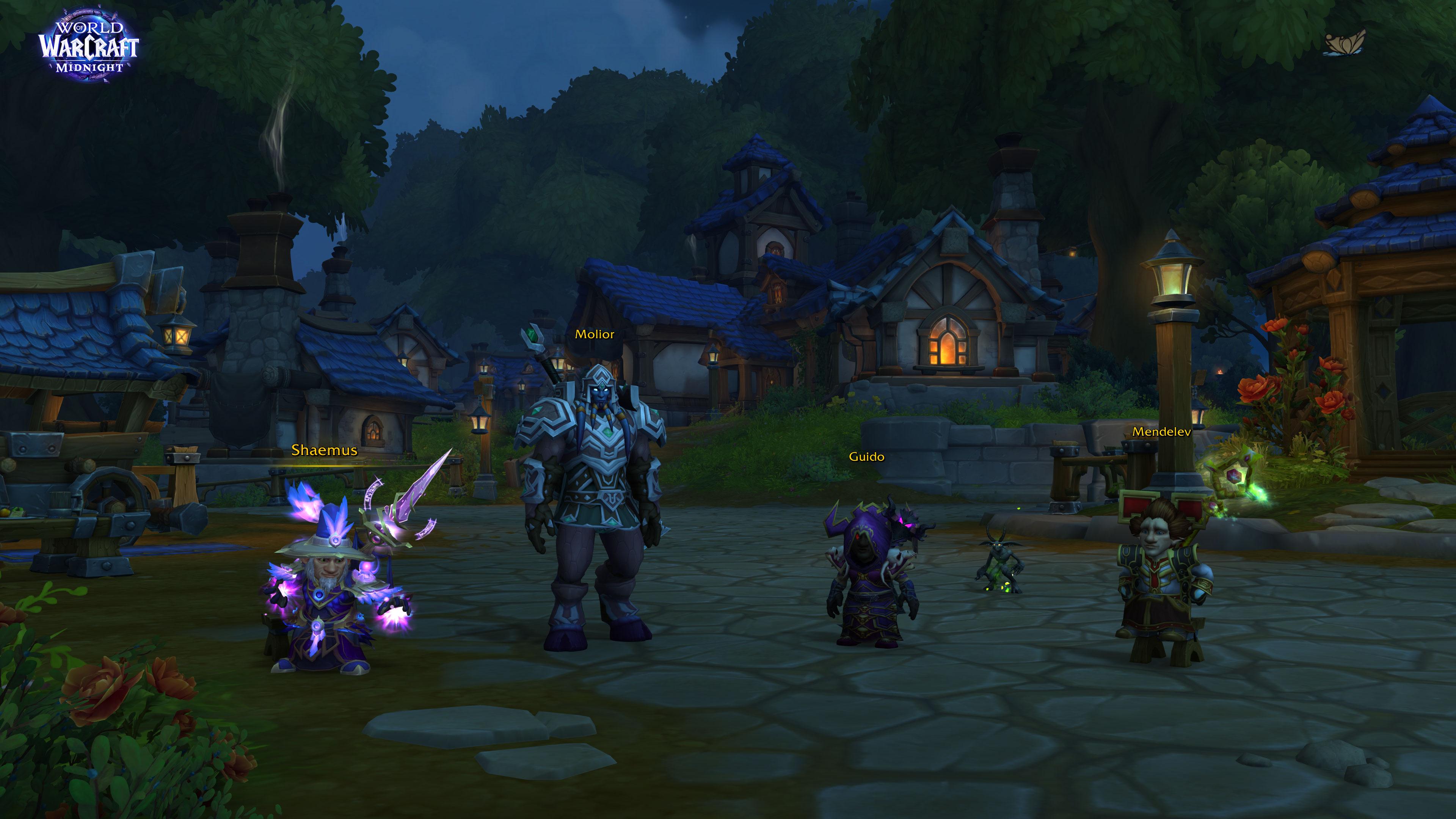 Four World of Warcarft characters in a screenshot.