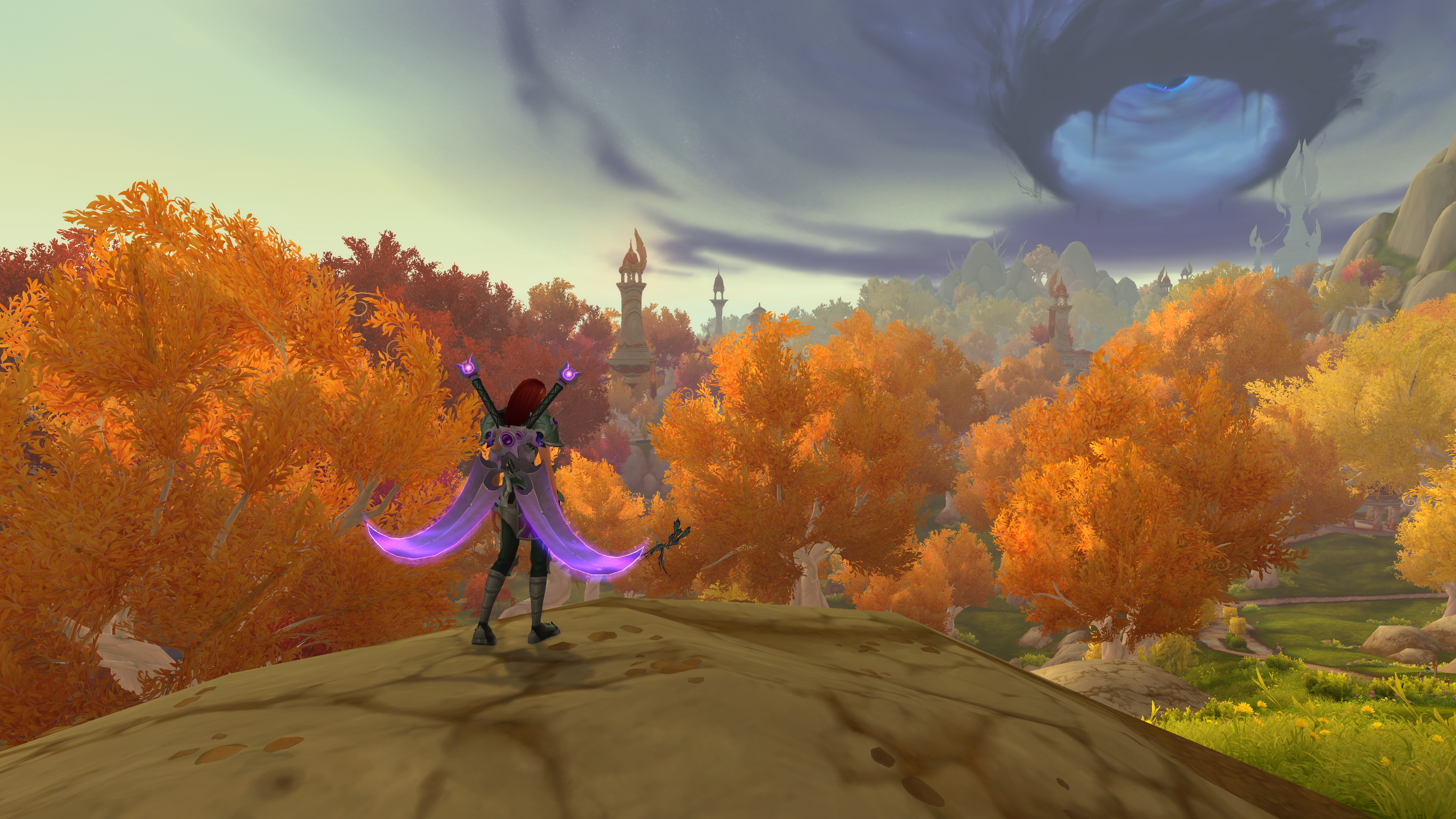 A void elf woman looking down at the orange and yellow trees of Eversong