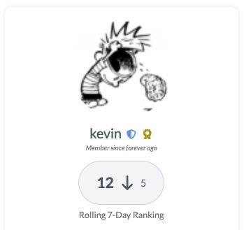 An screenshot of a TempusGameIt user card. In the top center is the avatar of the user (Calvin popping open his head and his brain jumping out). Below that is the username “Kevin” And below the username is a badge with holding a bold “12” followed by a down arrow, followed by “5”. That is the rolling 7-day ranking. Number 12 among all users, down 5 spots from this week prior.