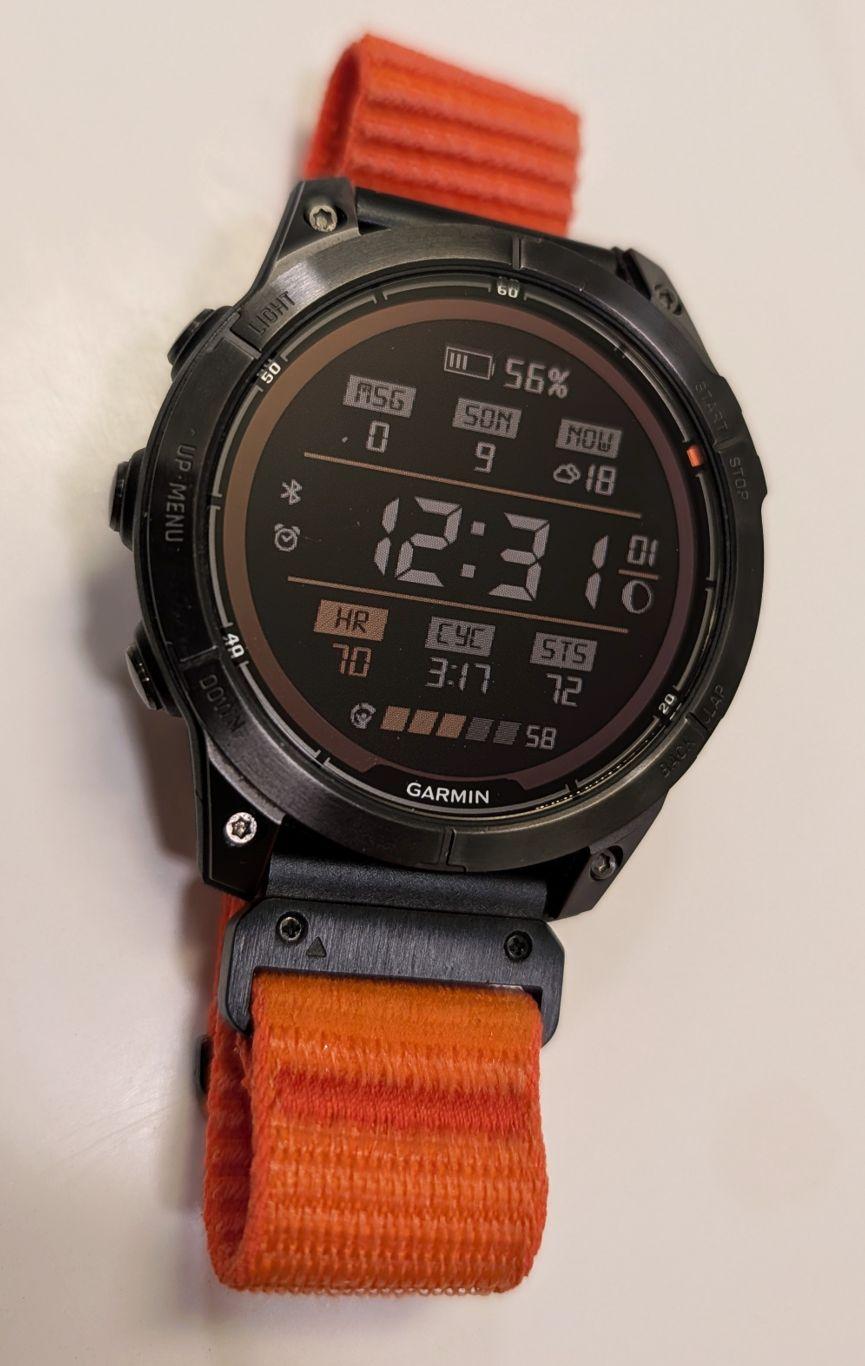Watch with strap.